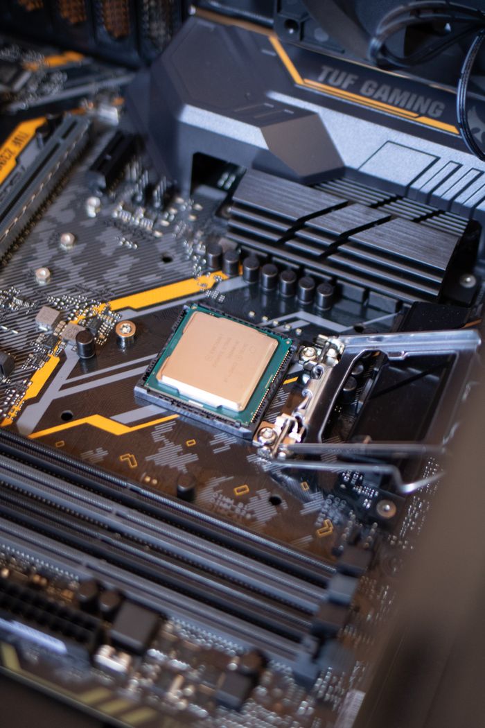 Offerings Detailed view of a motherboard with an exposed CPU, showcasing technology components.