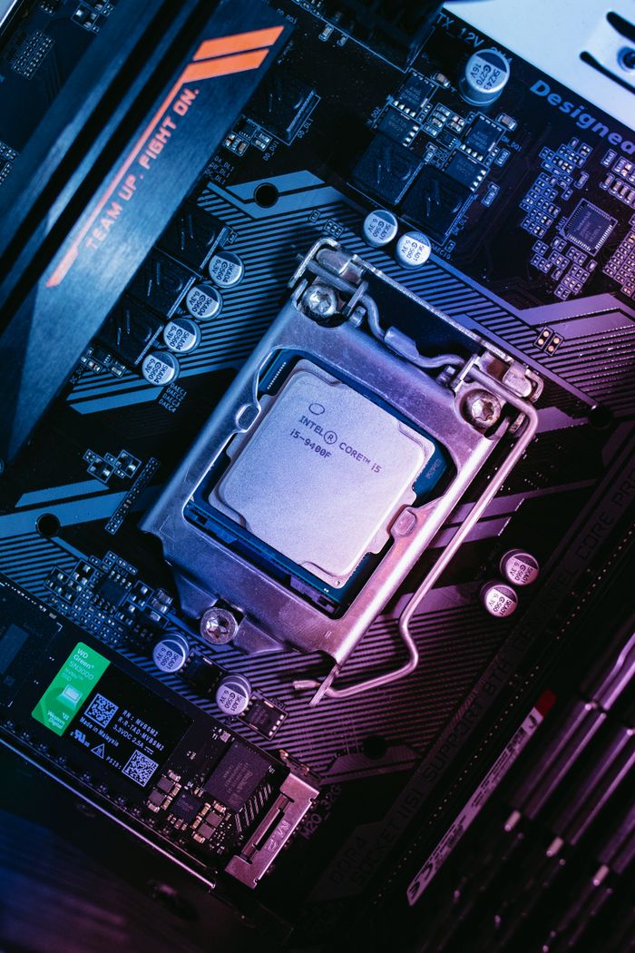 Mastering the First Impression: Your intriguing post title goes here Detailed view of a computer motherboard with installed CPU, showcasing high-tech components.